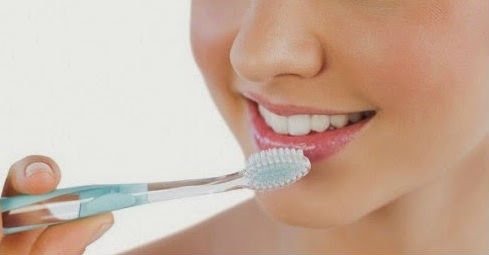 exfoliate lips with toothbrush